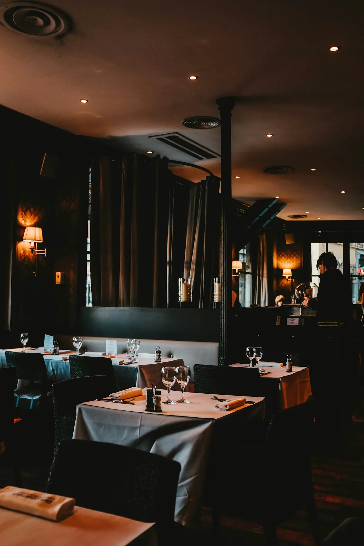 Candlelit tables and warm pendant light